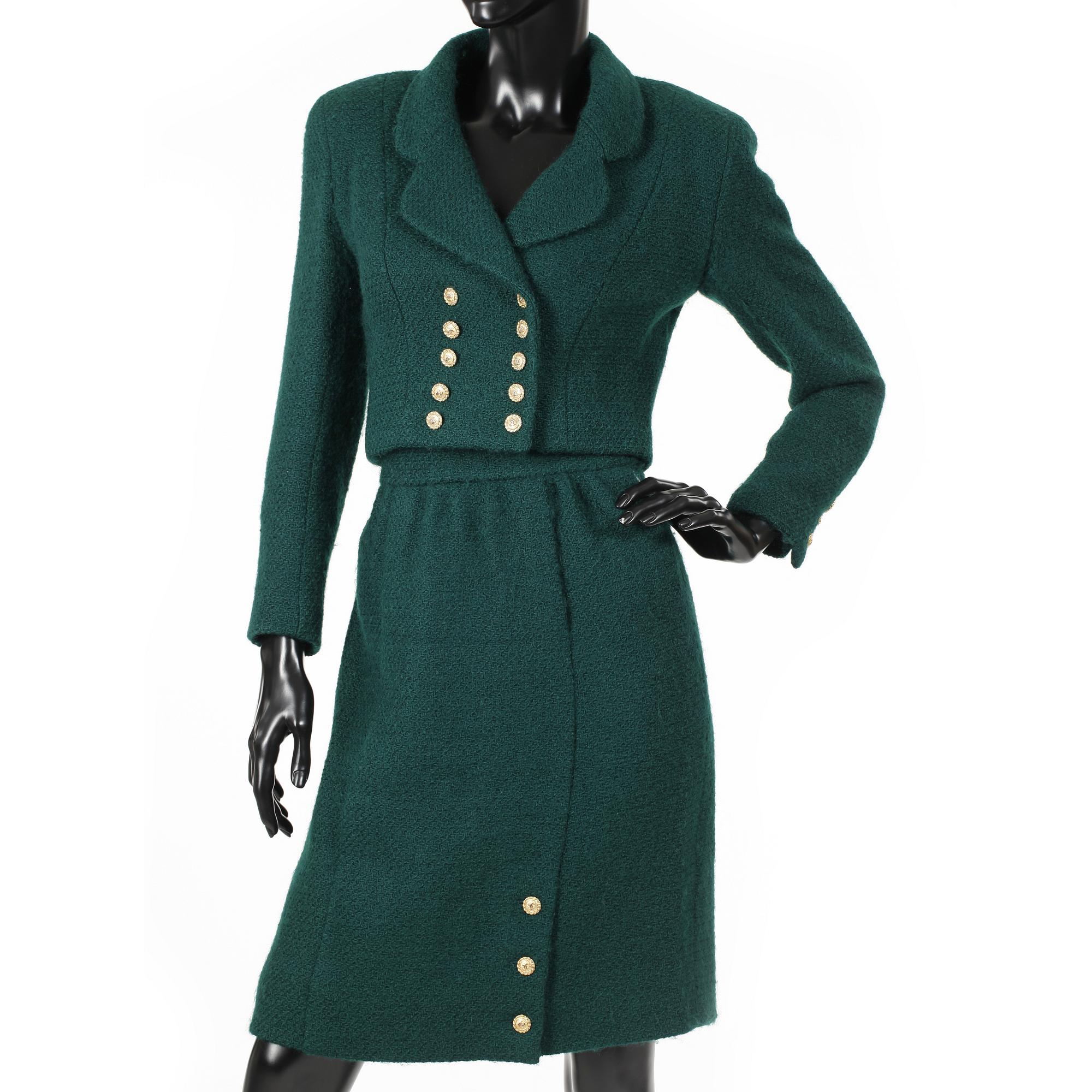 CHANEL, a two-piece suit consisting of short jacket and skirt.