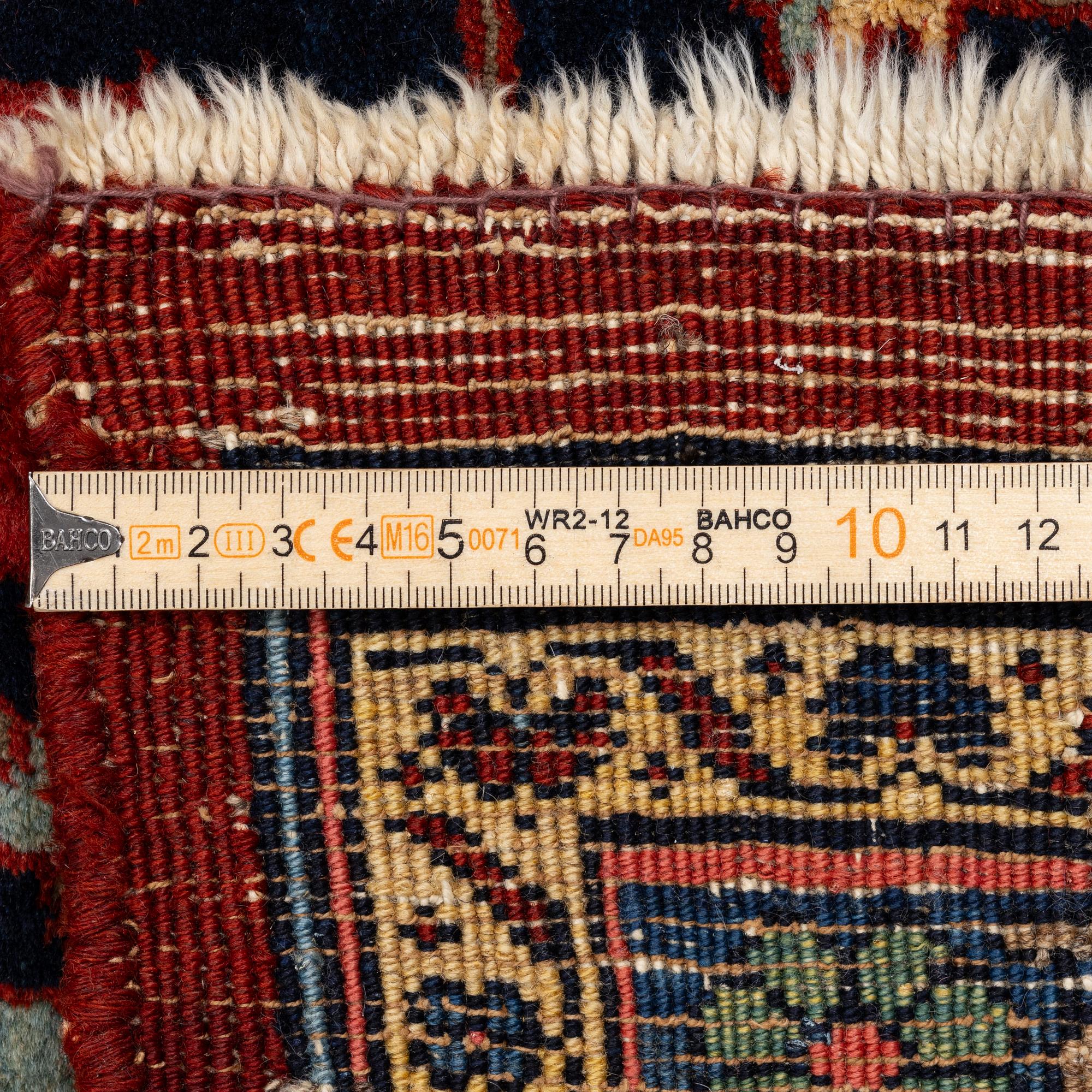 A semi-antique Bidjar carpet, c. 356 x 266 cm.