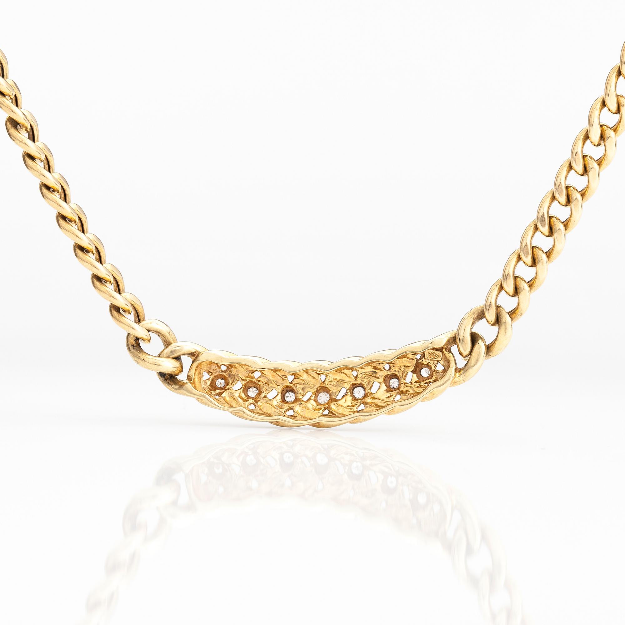 A 14K gold necklace with diamonds ca 0.035 ct in total.
