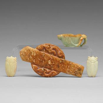 604. A nephrite brushwasher and three figurines, Qing dynasty or older.