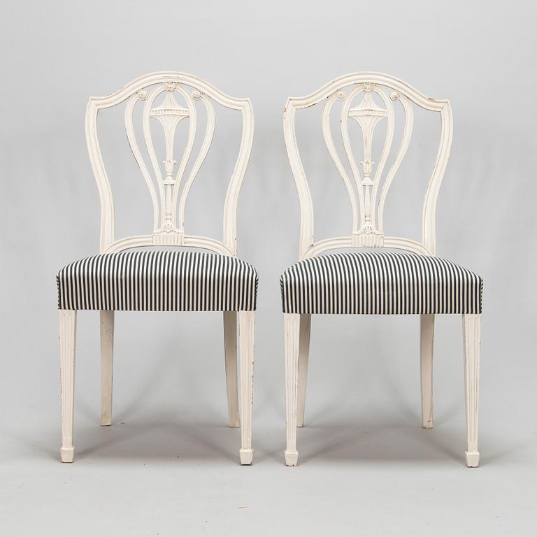 Four George III style chairs, early 20th century.