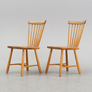 A set of eight 'Lilla Åland' birch chairs by Carl Malmsten for Stolab dated 1996.