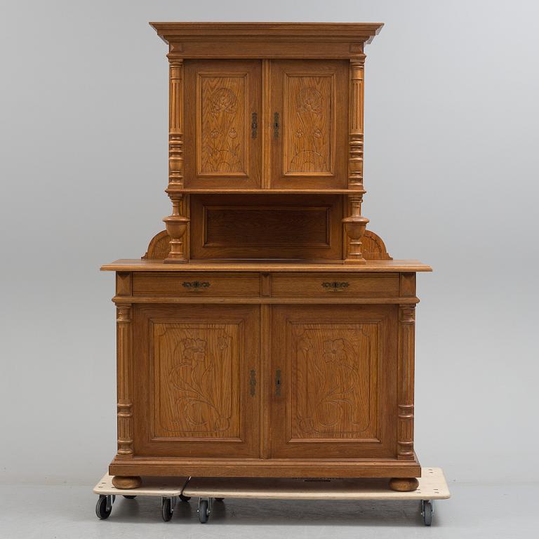 A circa 1900 oak cabinet.