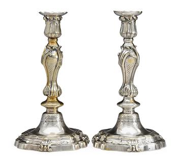 669. A pair of French Louis XV argent haché candelsticks, marked with C couronné (1745-49).