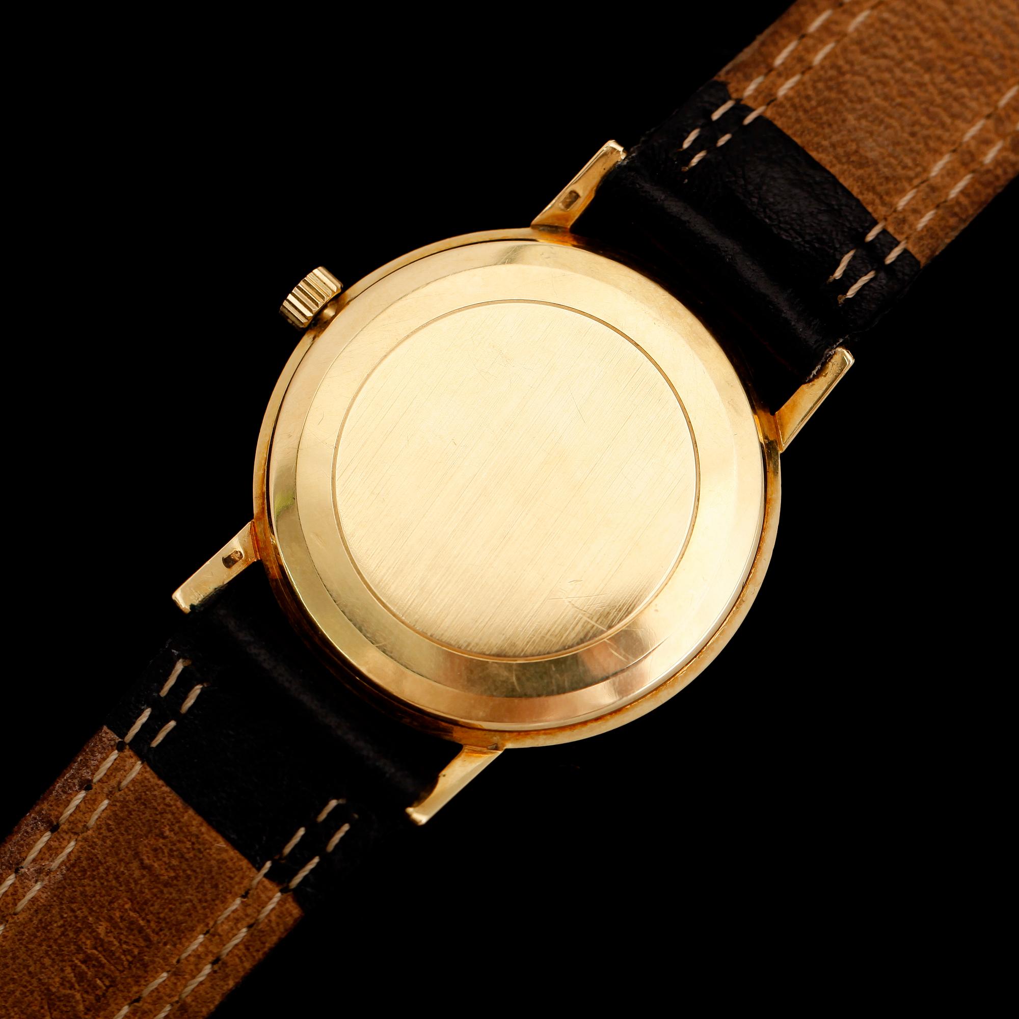 ARMBANDSUR, 18 k guld, Omega.