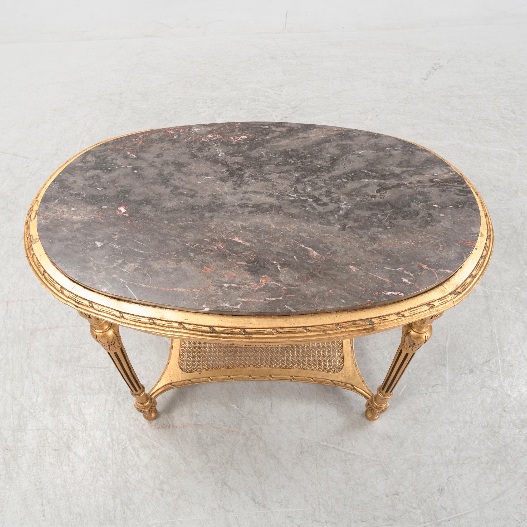 A Louis XVI style table, 20th Century.
