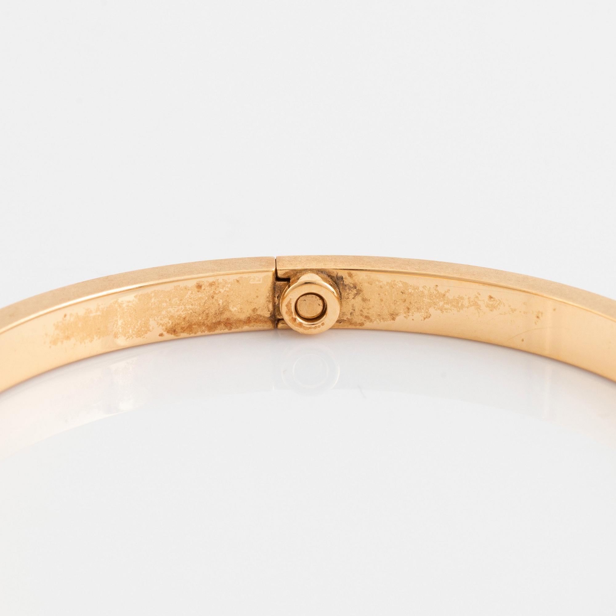 A Cartier Love bracelet small model in 18K gold set with round brilliant cut diamonds. size 16 total weight 17 g. Signed Cartier numbered DOT70. Bukowskis