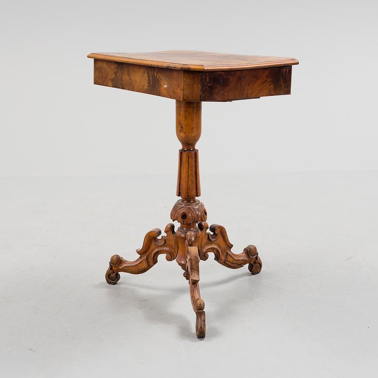 A 19th century sewing table.