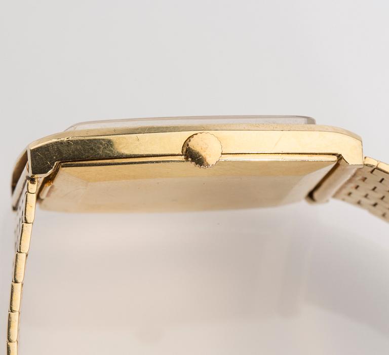 ARMBANDSUR, herr, Tissot, 18K guld. 1970-talets senare del. Vikt totalt ca 71 gram.