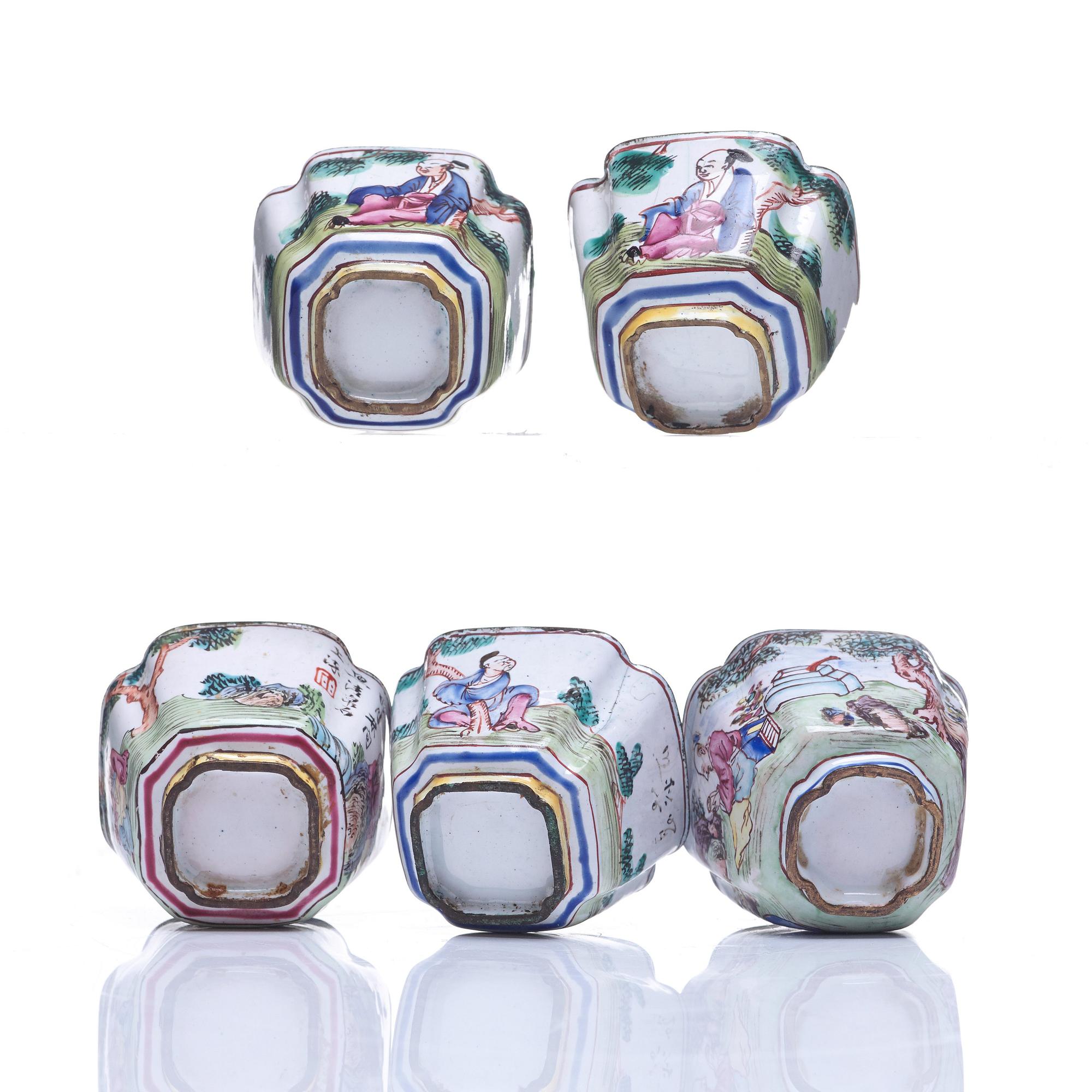 A set of five enamel on copper tea cups and a dish, Qing dynasty, circa 1800.