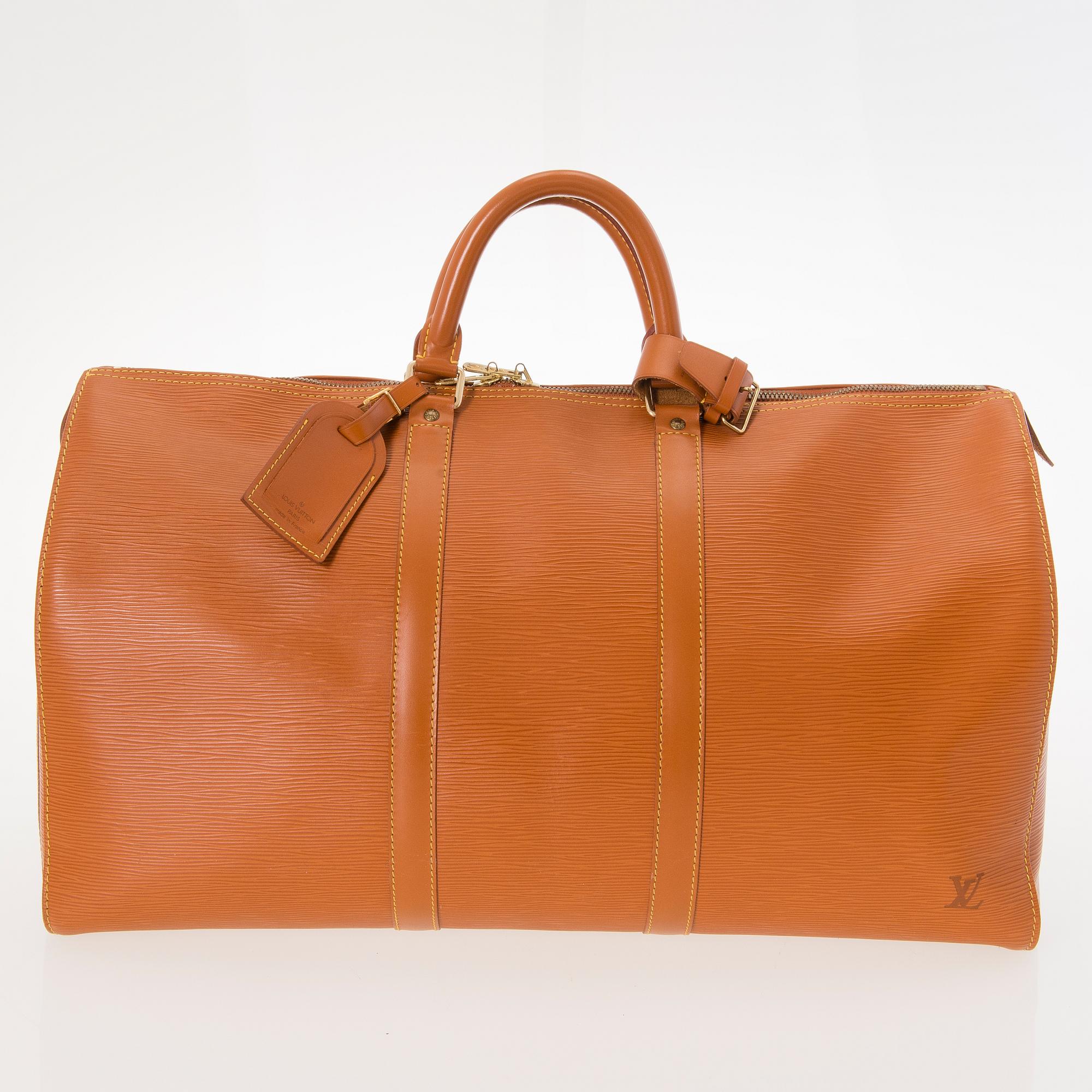 LOUIS VUITTON CIPANGO GOLD KEEPALL 50 EPI TRAVEL BAG.