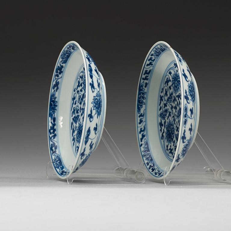 A pair of blue and white lotus dishes, Qing dynasty (1644-1912) with Kangxi six characters mark.