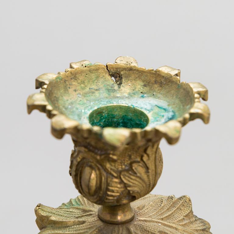 A pair of bronze candelabra from the latter half of the 19th Century.