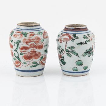 A pair of porcelain miniature urns, China, Ming dynasty, (1364-1644).