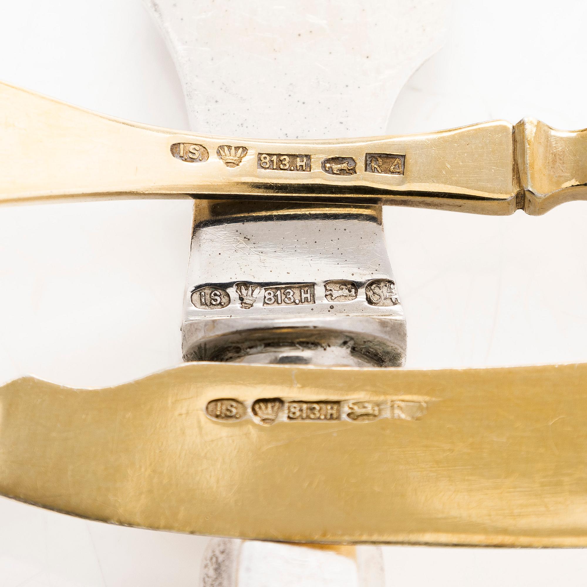 A 12-piece set of parcel-gilt fruit cutlery, and a silver butter knife, maker's mark Iisakki Saha, Pori 1898-1899.