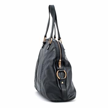 YVES SAINT LAURENT, a black leather shoulder bag, "Muse".
