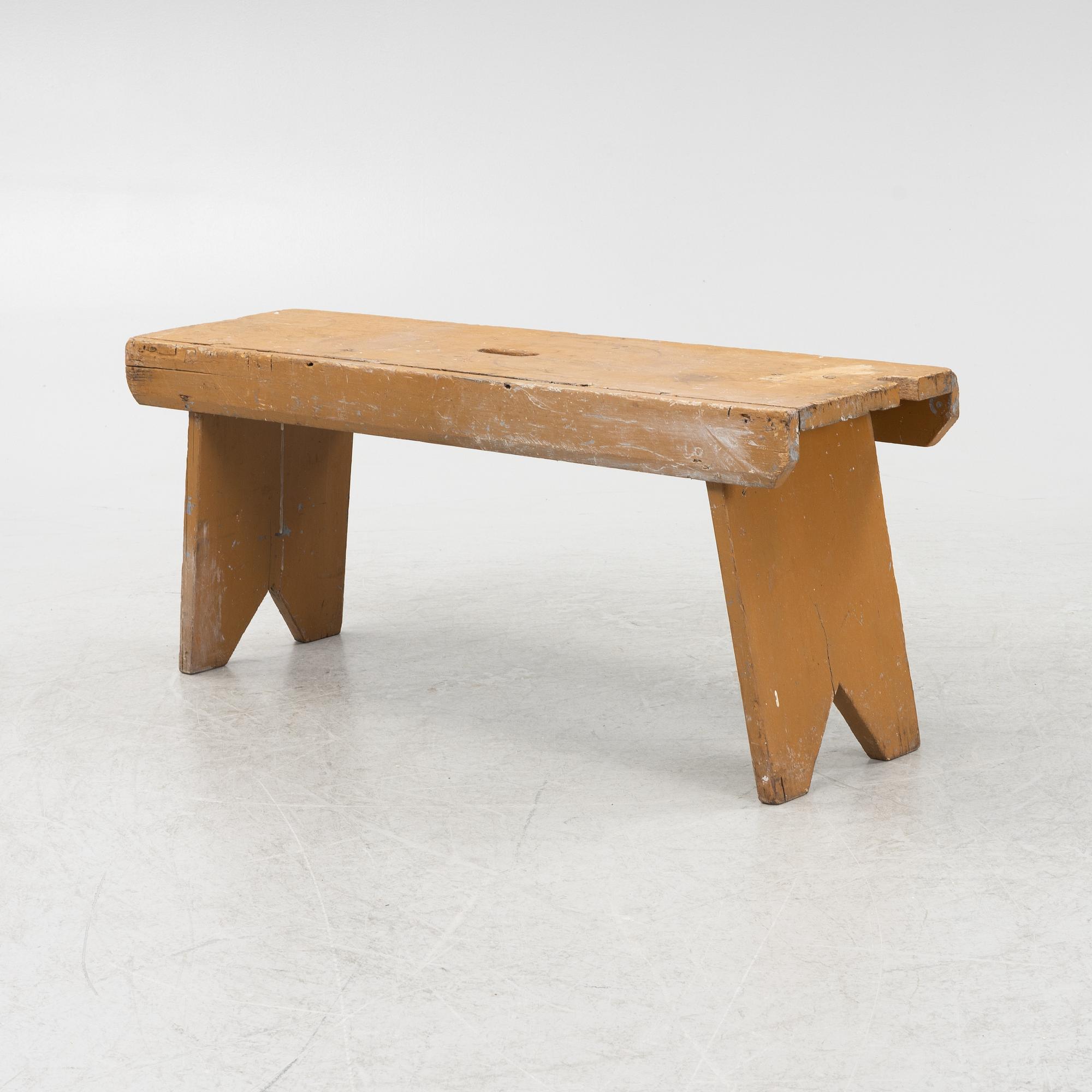 A painted bench, circa 1900.