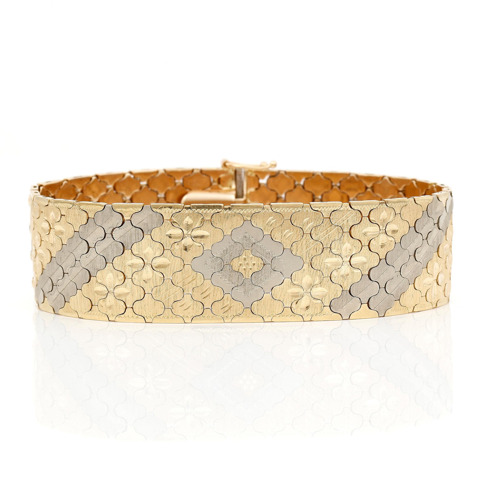 ARMBAND, tvåfärgat 18K guld, Vincenza, Italien, 1900-talets sista kvartal. Total vikt 57 g.