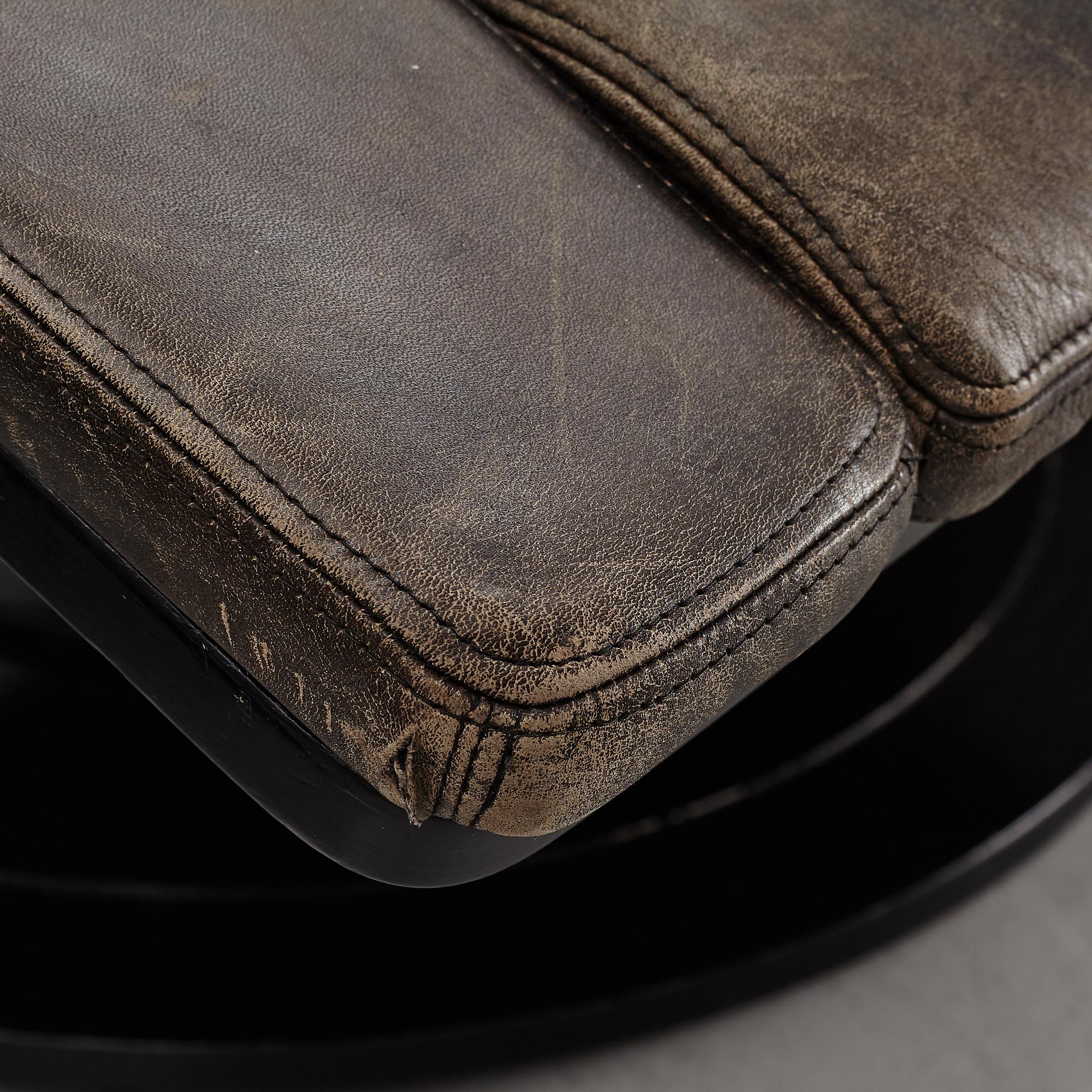 Takashi Okamura & Erik Marquardsen, a "Wave" armchair with ottoman, Nelo, 1970's.