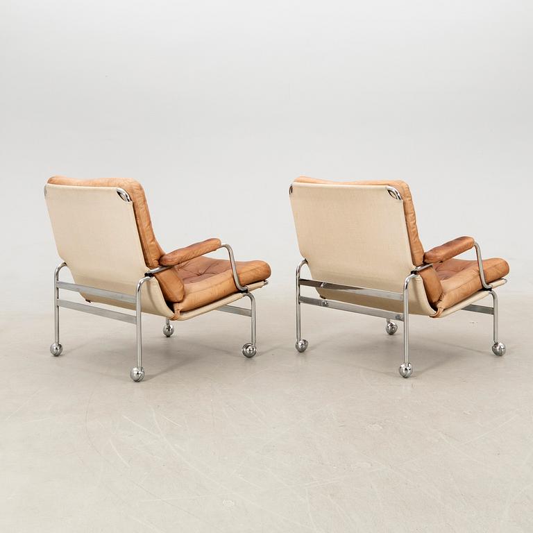 Bruno Mathsson, a pair of "Karin" armchairs for Dux, late 20th century.