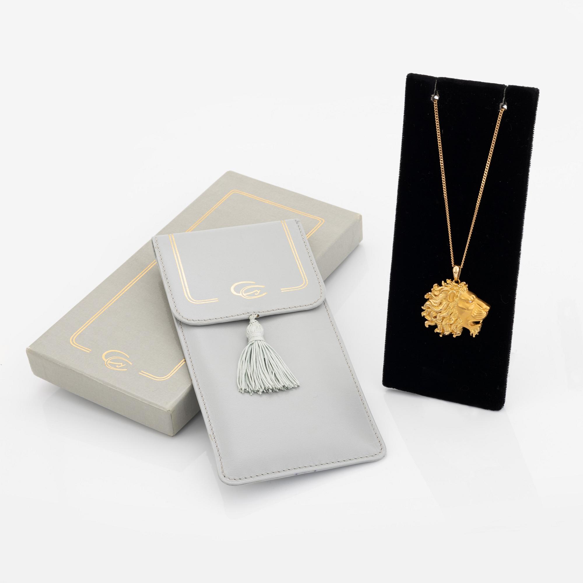 Carrera y Carrera, hänge lejon 18K guld med en briljantslipad diamant, kedja 18K guld.