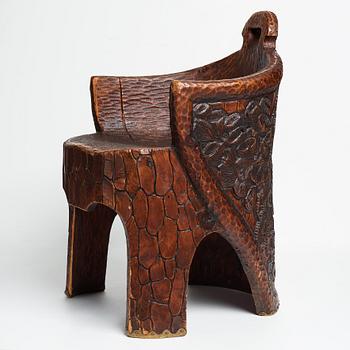 Gustaf Fjaestad, a pair of Art Nouveau carved pine chairs "stabbestolar", Arvika Sweden 1908-1909.