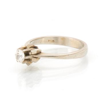 An 18K white gold and diamond ring, approx. 0.2 ct.