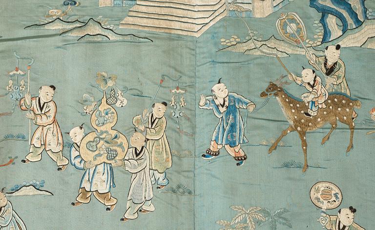 A large embroidered silk panel lined with wool, late Qing dynasty.