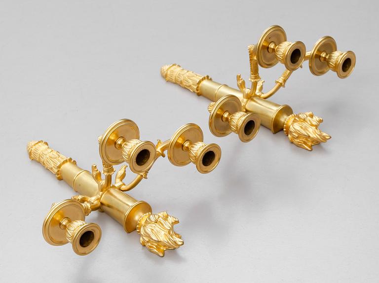 VÄGGAPPLIQUER, 1 par, förgylld brons, empire, 1800-talets början.