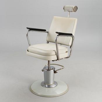 A 1950s barber chair.