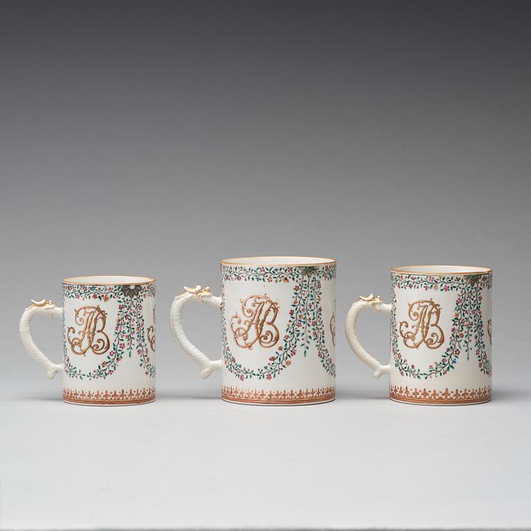 A group of three famille rose armorial jugs, Qing dynasty, Qianlong (1736-95).