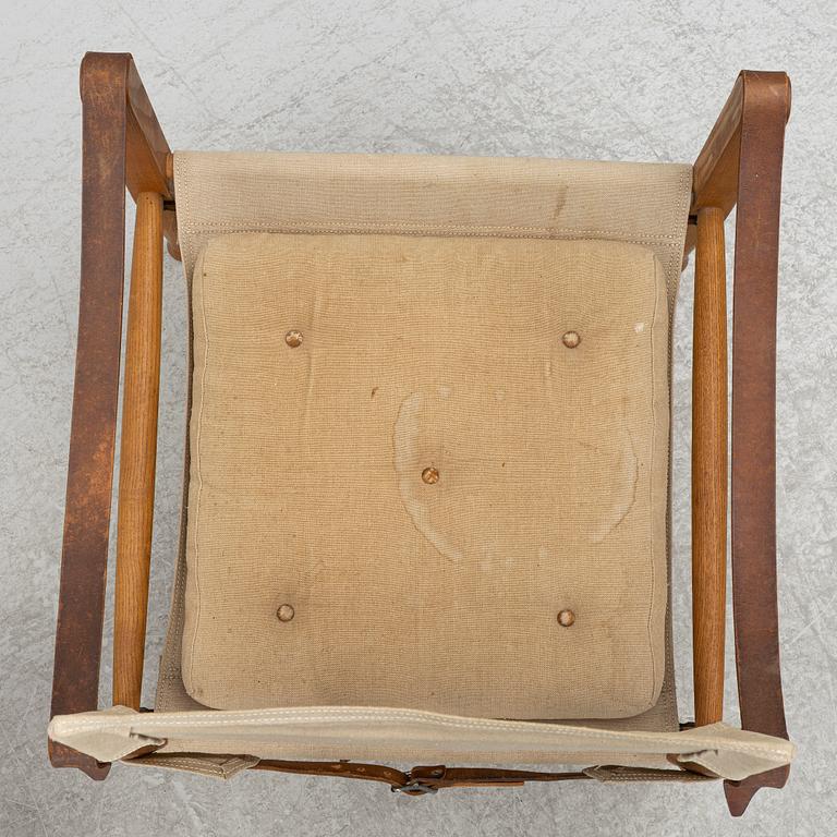Kaare Klint, A pair of 'Safari' armchairs, Rud. Rasmussen's Snedkerier, Denmark, second half of the 20th century.