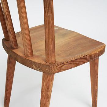 Axel Einar Hjorth, a set of four stained pine "Utö" chairs, Nordiska Kompaniet, Sweden 1930s.