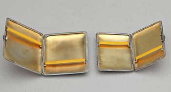 CIGARETTETUIN, 2 st, silver och emalj, bla C G Hallberg, 1900-talets början.