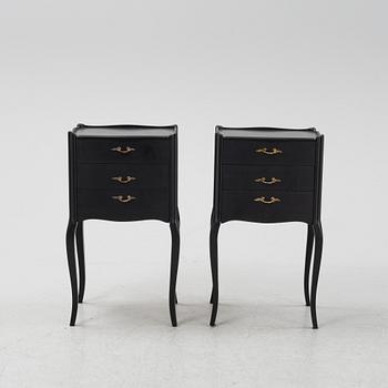 A pair of painted Rococo style bedside tables, second half of the 20th Century.