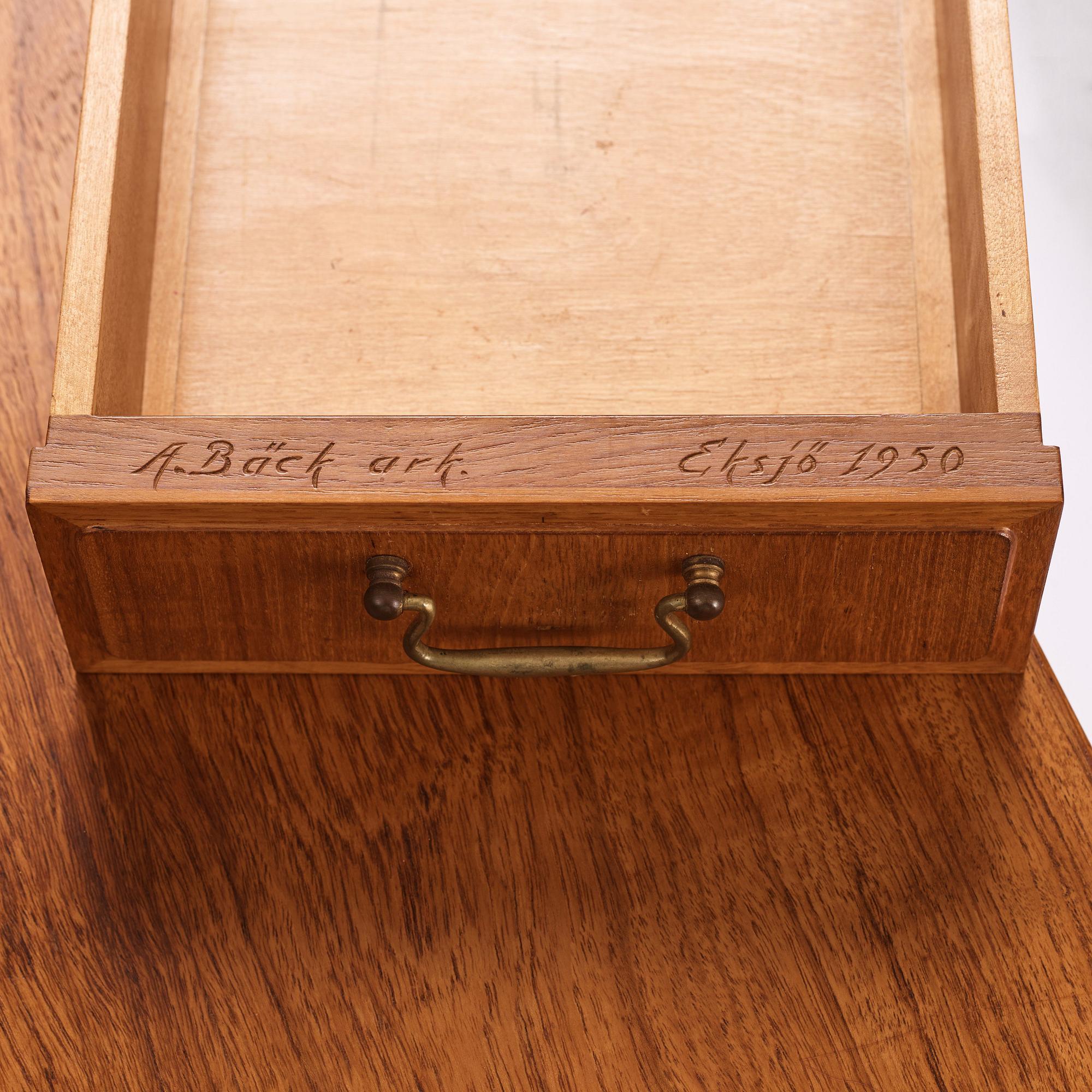 Axel Bäck, a Swedish Modern mahogany veneered sideboard, Eksjö Möbelfabrik, Sweden 1950, signed.