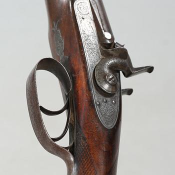 A percussion rifle by Charles William Lanchester in London, around the mid 19th century.