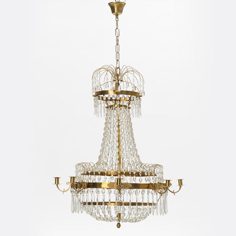 A Gustavian style 9 candle chandelier.