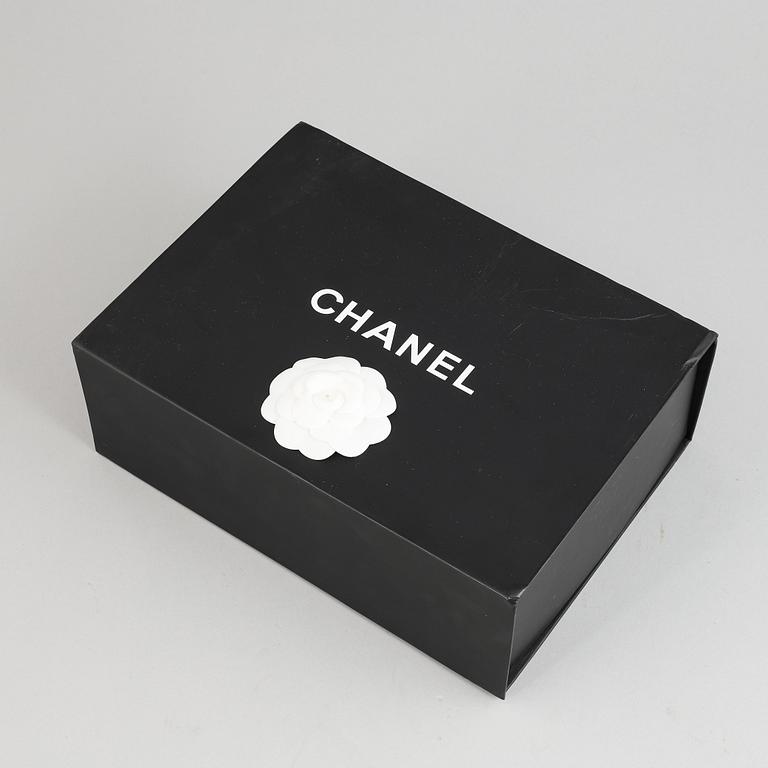 CHANEL, a 'Double Flap' quilted leather handbag, 2013-4.