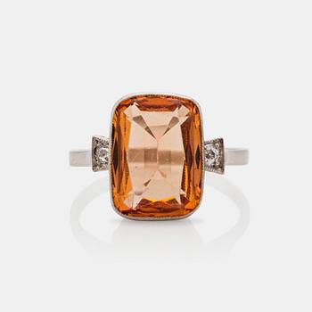 586. A circa 3.30 ct topaz and old-cut diamond ring. Total carat weight of diamonds circa 0.10 ct.