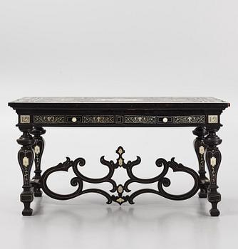 A Renaissance-style ebony, ebonized and ivory-inlaid library table, late 19th century, presumably Germany.