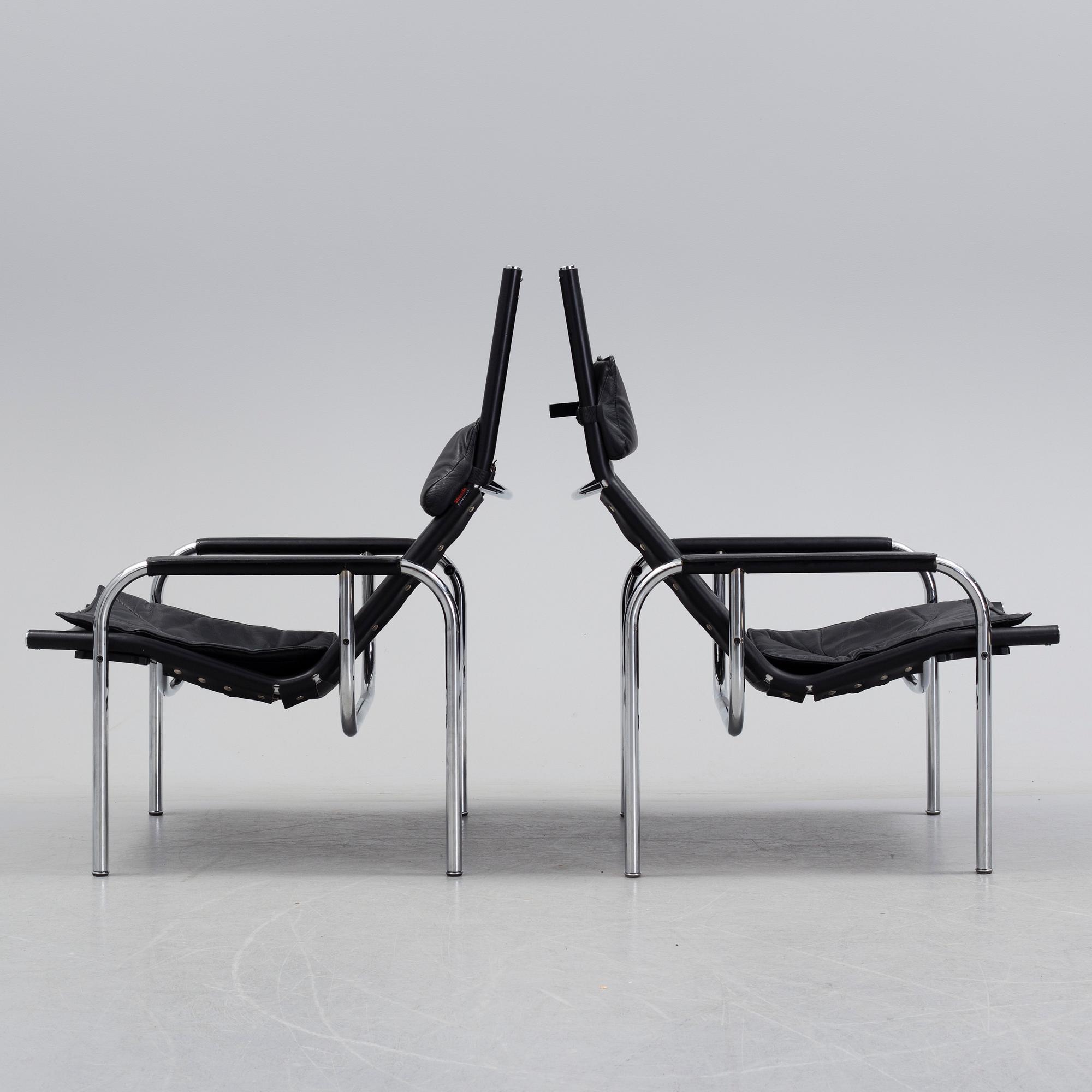 A pair of easy chairs and ottoman, designed by Hans Eichenberger, Strässle, Switzerland.
