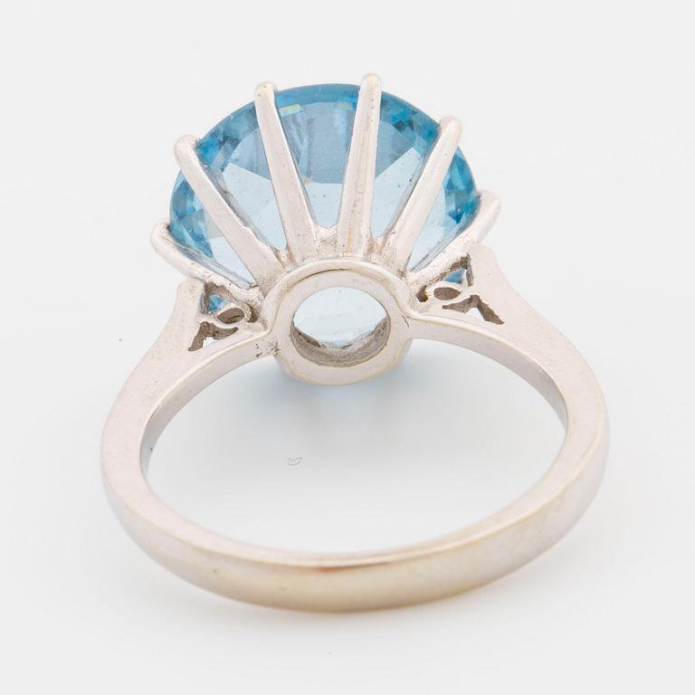 A ring with synthetic blue spinel.