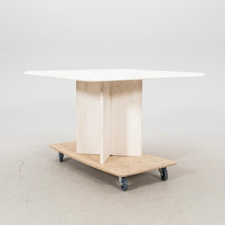 A polished travertine table from the second half of the 20th century.