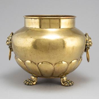 A 19th century brass flower pot.