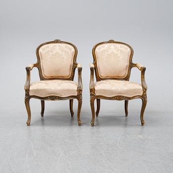A pair of Louis XV-style arm chairs, 20th century.