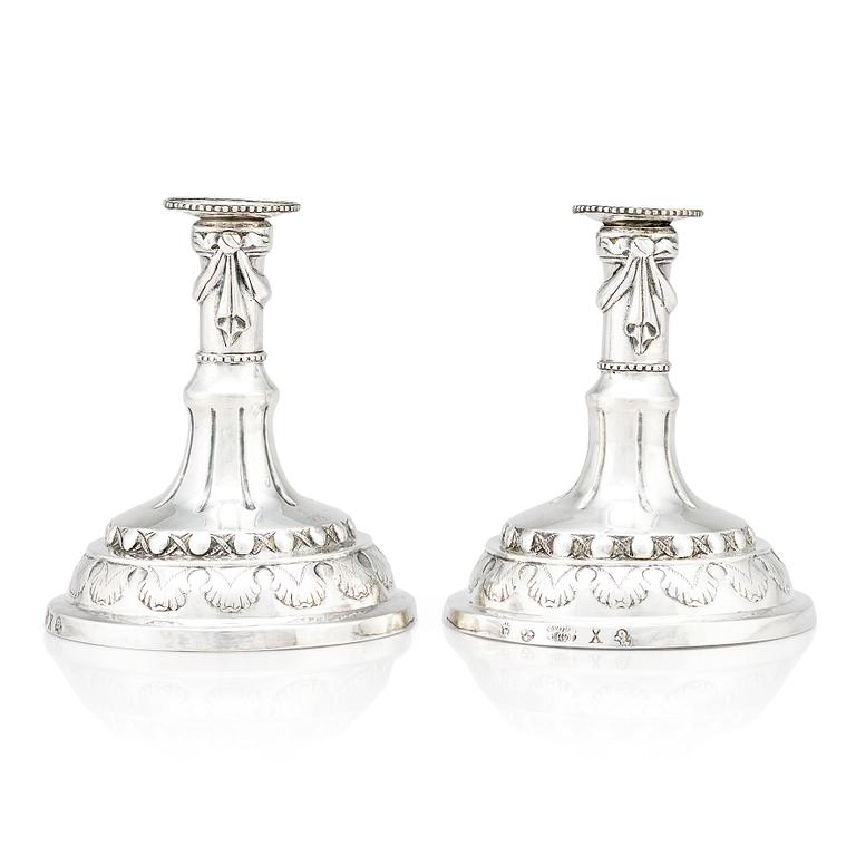 A pair of Swedish silver candlesticks, marks of Sigismund Novisadi the younger, Karlskrona 1780.