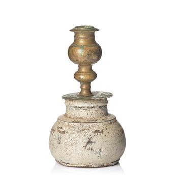 405. A Northern European baroque candlesticks, late 17th century, with a repaired wooden base.
