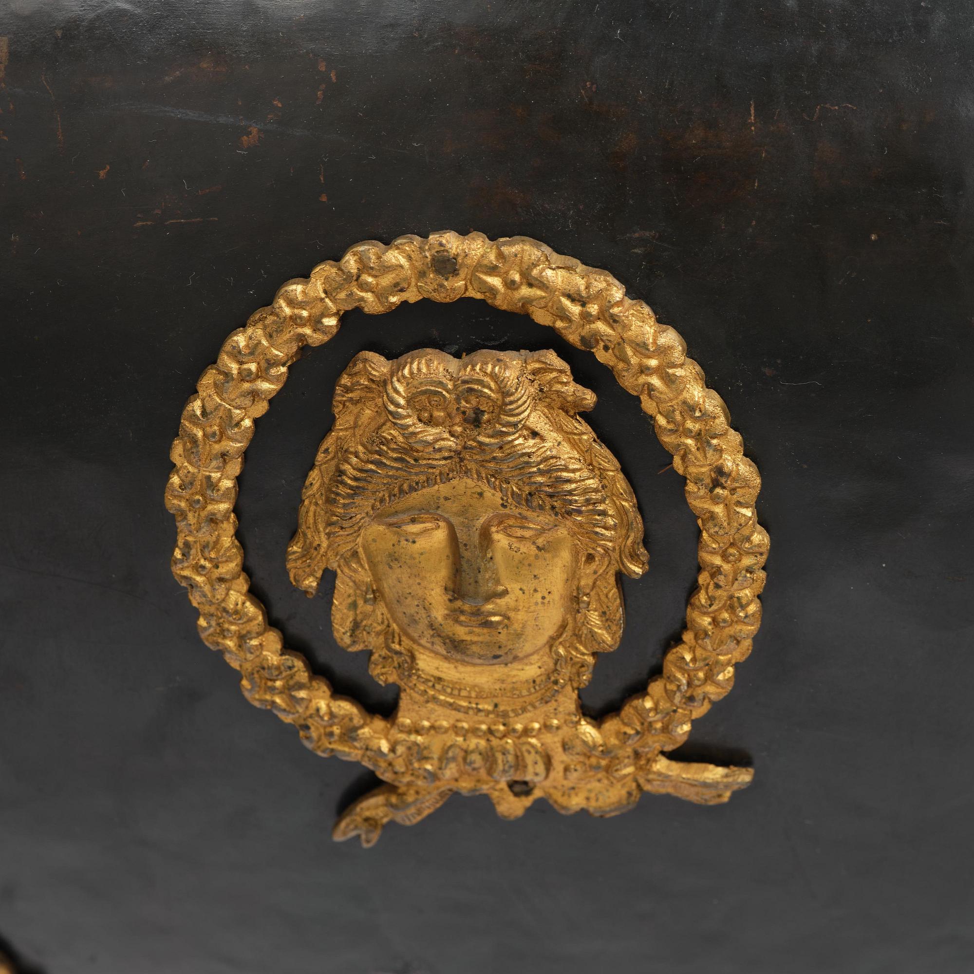 A presumably Russian Empire gilt and patinated bronze nine-branch chandelier, 19th century.