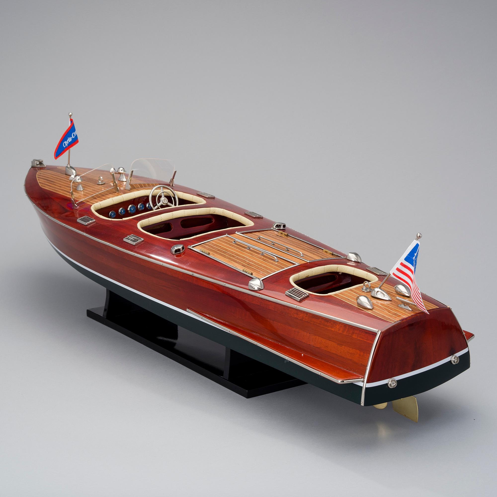 A "Chris-Craft triple cockpit" model boat, 21st century.